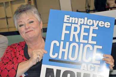 Becky Moeller with Employee Free Choice sign